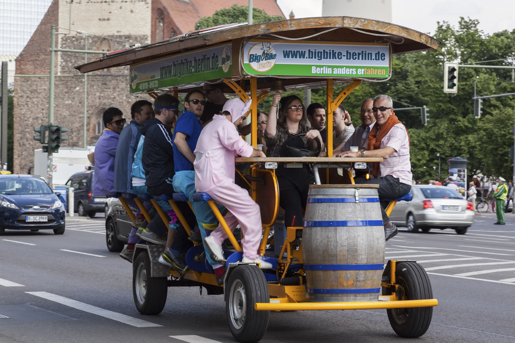 Group of men in Berlin on bicycle bus 