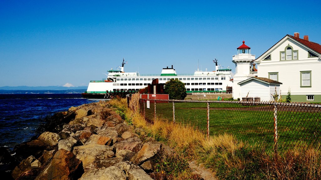 Mukilteo showing rugged coastline, a house and cruising