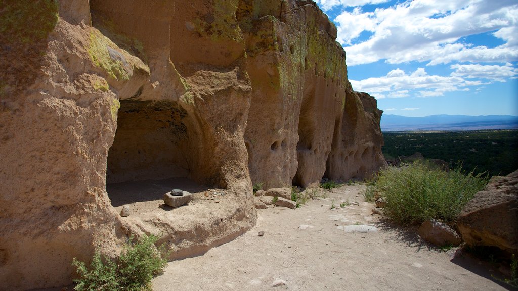 Puye Cliff Dwellings which includes landscape views and caves