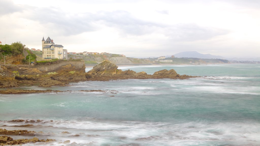 Virgin\'s Rock showing rocky coastline and landscape views