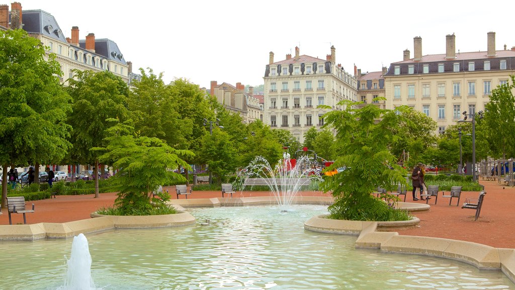 La Presqu\'ile showing a square or plaza, a fountain and a pond