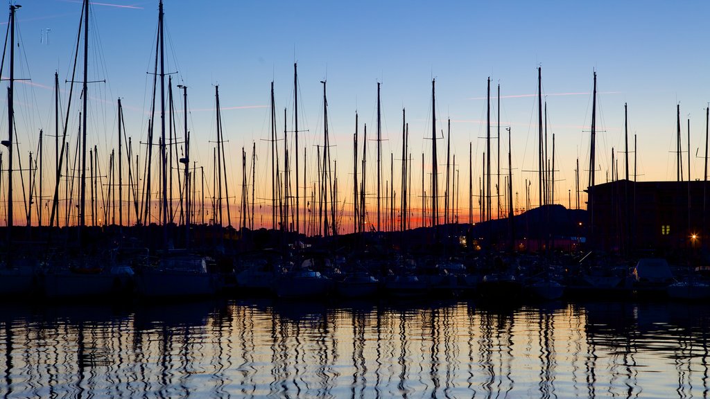 Port of Toulon showing a marina, a sunset and general coastal views