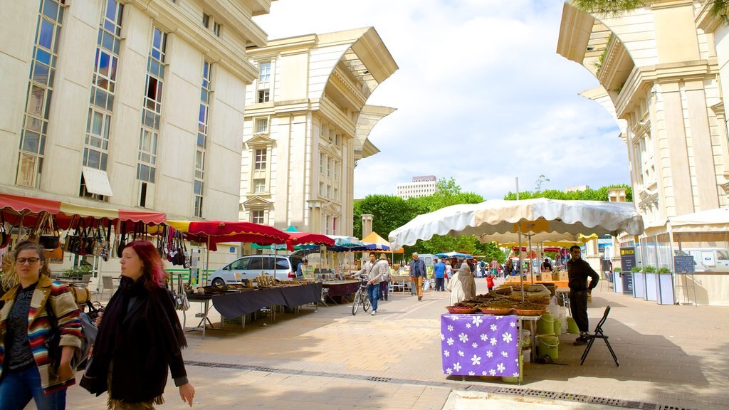 Esplanade de l\'Europe which includes markets, street scenes and outdoor eating