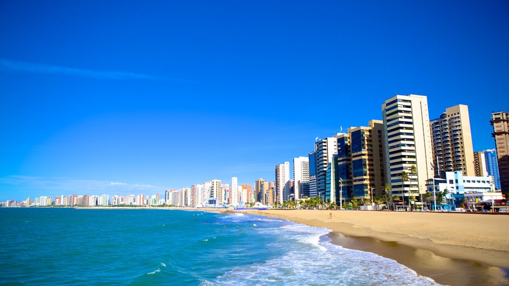 Fortaleza which includes a beach, a skyscraper and city views