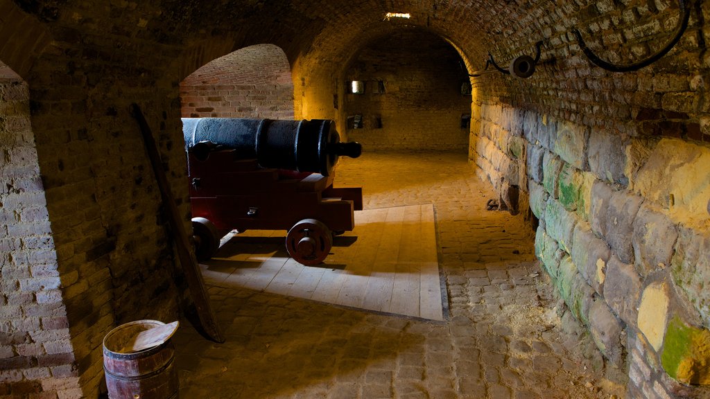 Fort St. Pieter which includes château or palace, military items and interior views