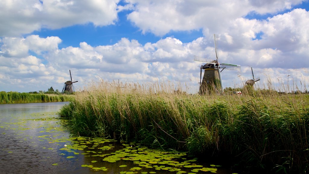 Kinderdijk showing a river or creek, a windmill and wetlands