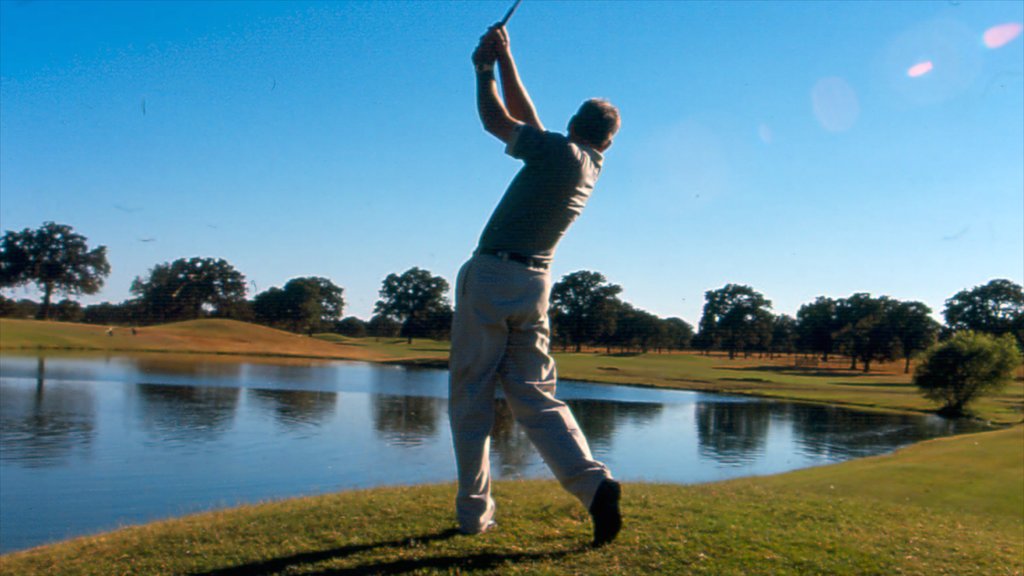 Fredericksburg showing golf, a pond and landscape views