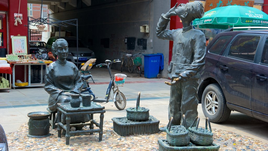 Drum Tower featuring outdoor art and street scenes