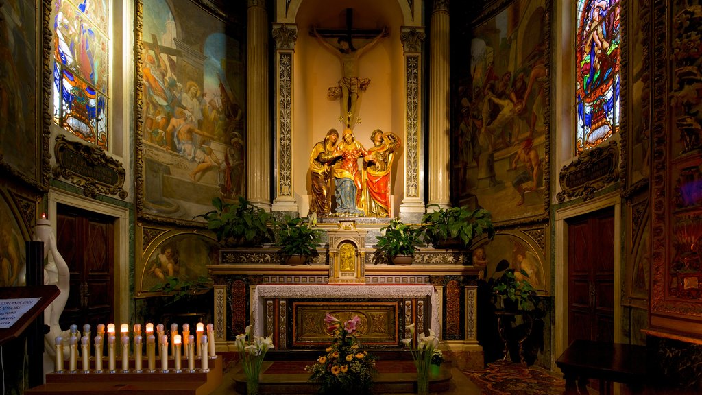 Basílica de San Vittore mostrando elementos religiosos, vista interna y una iglesia o catedral