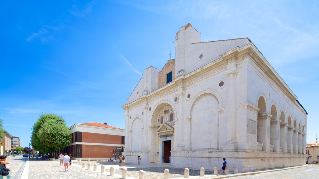 Tempio Malatestiano which includes a church or cathedral, heritage elements and religious elements