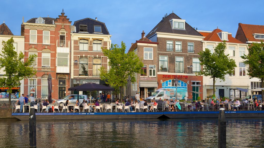 Beestenmarkt featuring a coastal town, a river or creek and outdoor eating