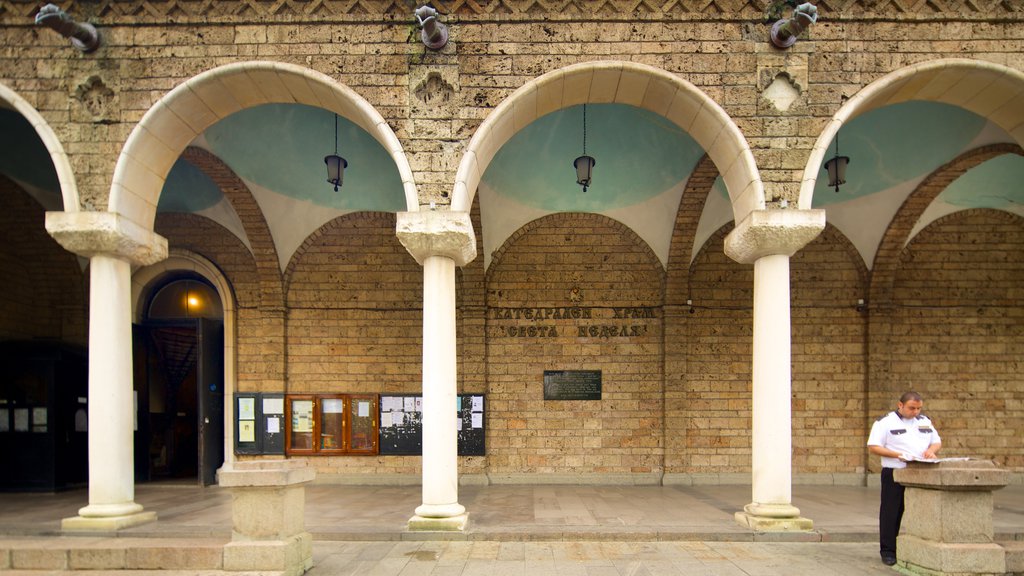 Church of St. George showing street scenes as well as an individual male