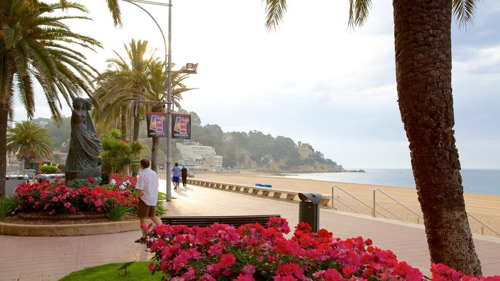 Lloret de Mar Beach which includes street scenes, general coastal views and flowers