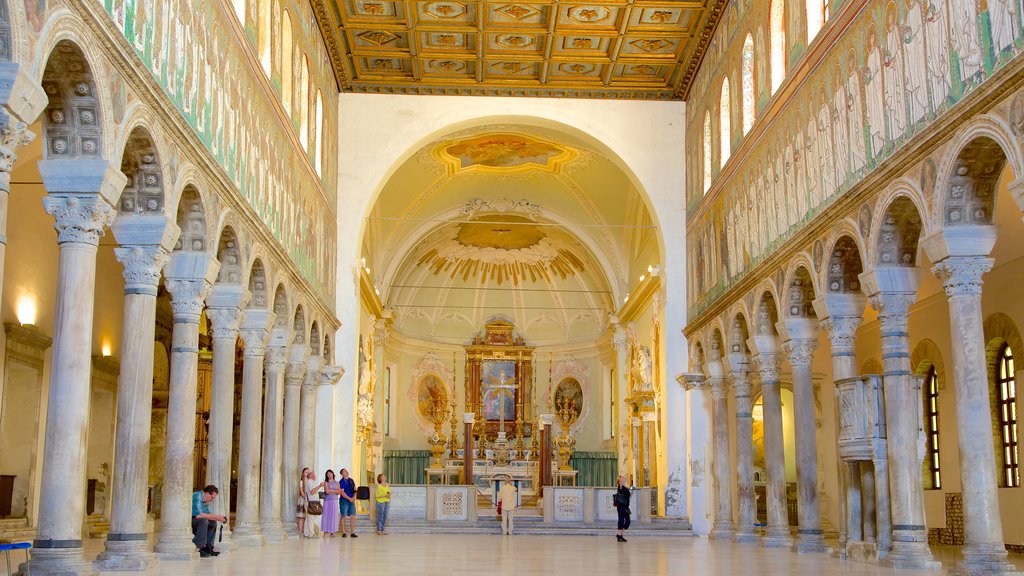 Basilica of Sant\' Apollinare Nuovo which includes interior views, religious aspects and a church or cathedral