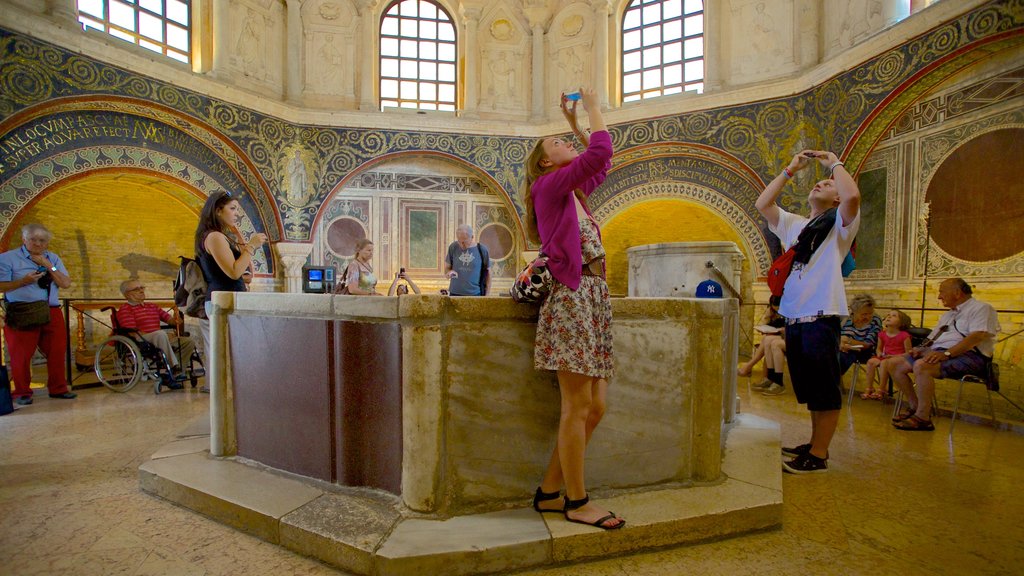 Baptistry of Neon which includes religious elements, interior views and a church or cathedral