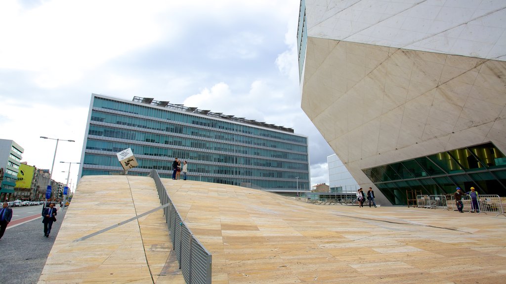 Casa da Musica which includes modern architecture and street scenes