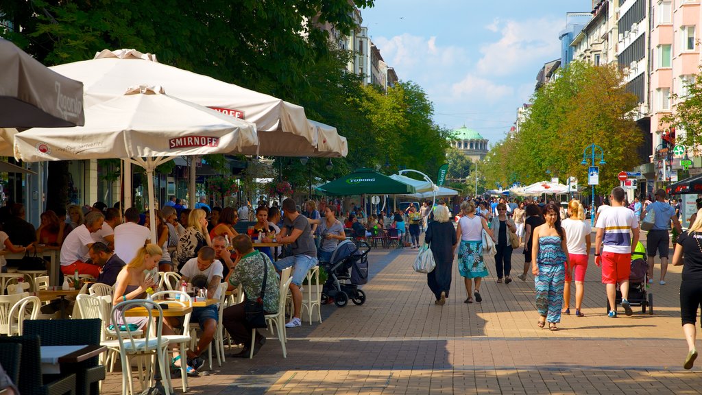 Vitoshka Boulevard showing outdoor eating as well as a small group of people