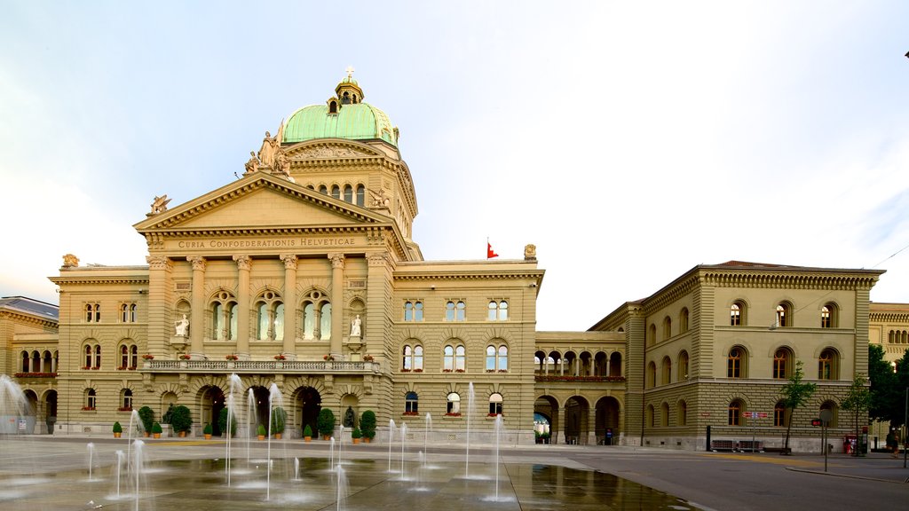 Bundeshaus que incluye una fuente, una plaza y arquitectura patrimonial