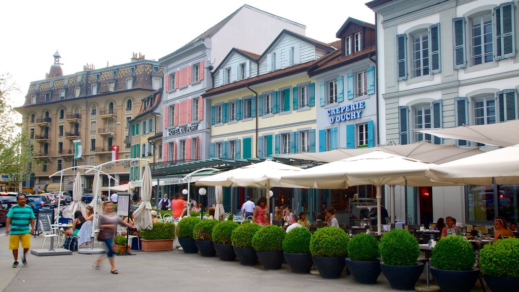 Lausanne showing street scenes as well as a large group of people