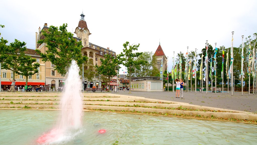 Lausana mostrando una fuente y una plaza