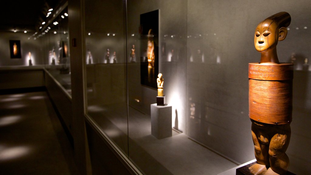 Barbier-Mueller Archeology Museum featuring a statue or sculpture and interior views