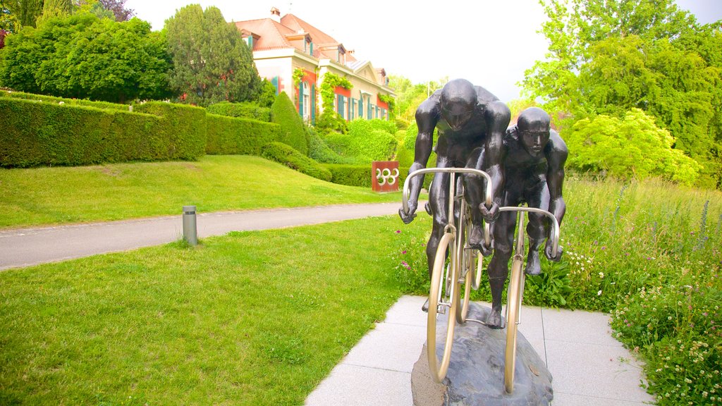 Olympic Museum featuring a statue or sculpture and outdoor art