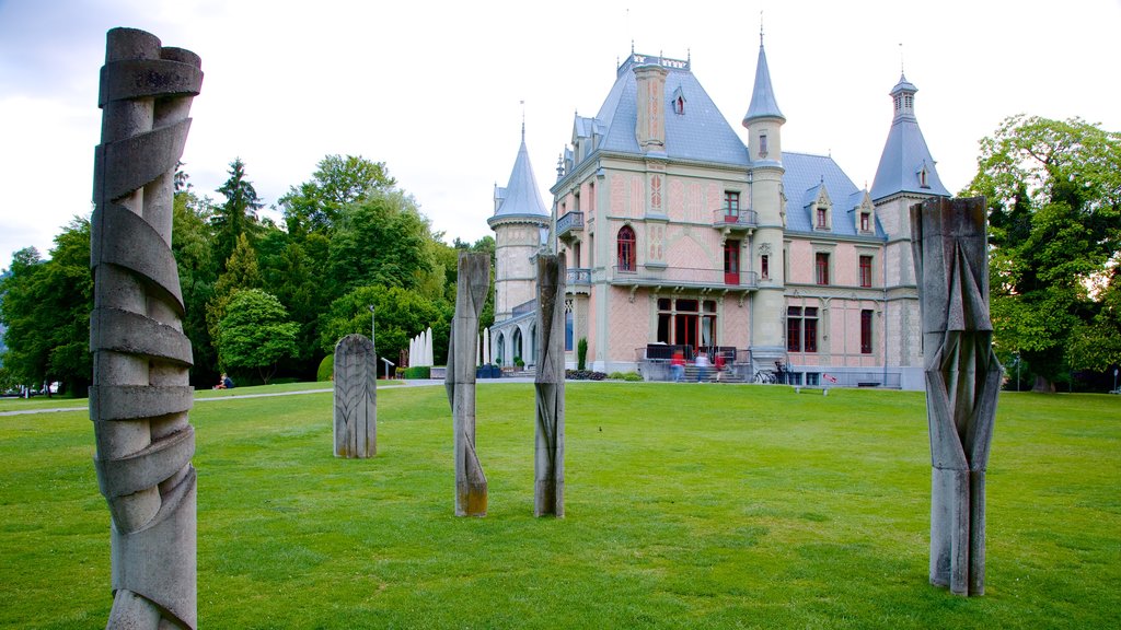 Schadaupark showing a garden, outdoor art and a castle