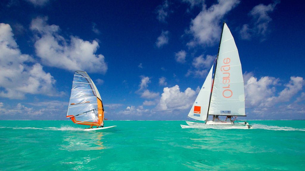 Tahiti showing general coastal views and windsurfing