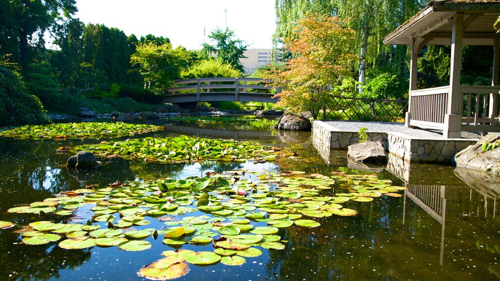 Kasugai Gardens featuring a pond and a garden