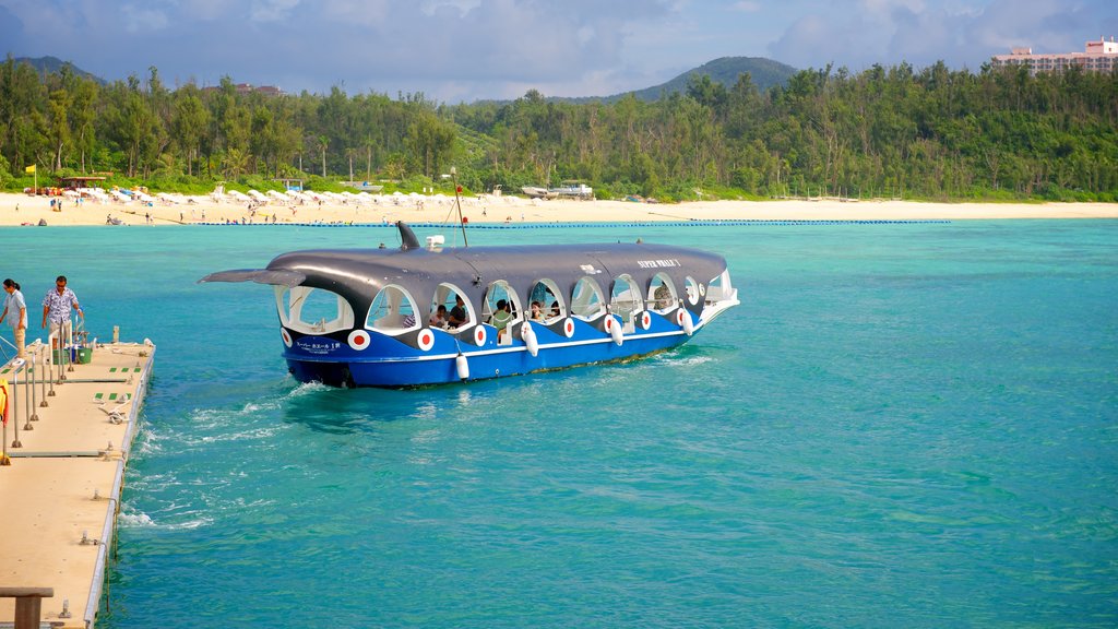 Busena Marine Park showing a sandy beach and boating