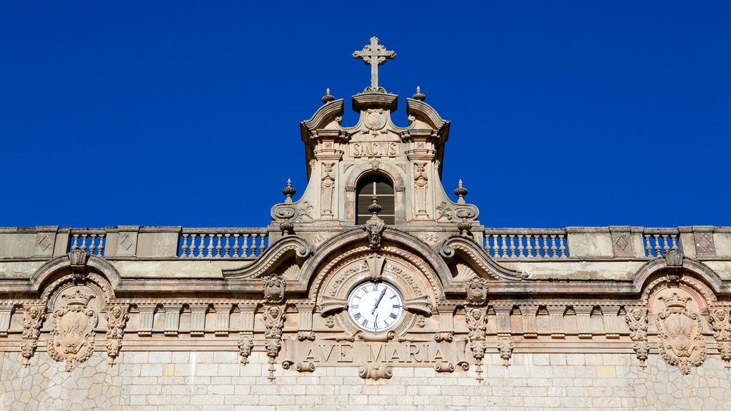 Lluc Monastery featuring heritage architecture and religious aspects