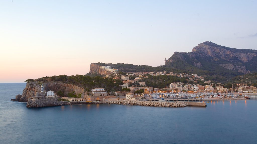 Port de Soller Lighthouse showing a coastal town, a bay or harbor and general coastal views