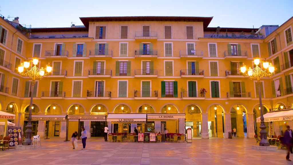 Plaza Mayor de Palma showing a square or plaza and a sunset