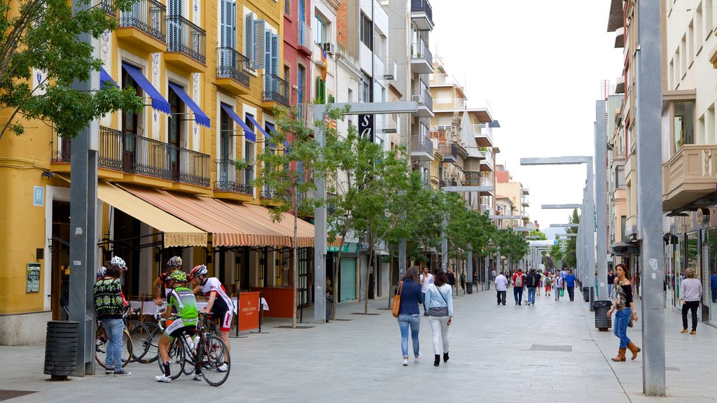 Granollers showing street scenes as well as a large group of people