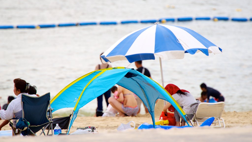 Okinawa which includes a sandy beach