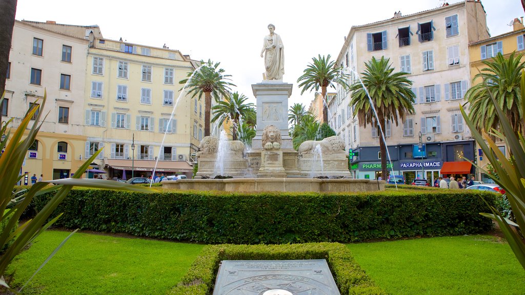 Place Foch featuring a fountain, a park and a statue or sculpture