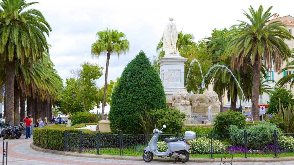 Place Foch showing a fountain, a garden and a statue or sculpture