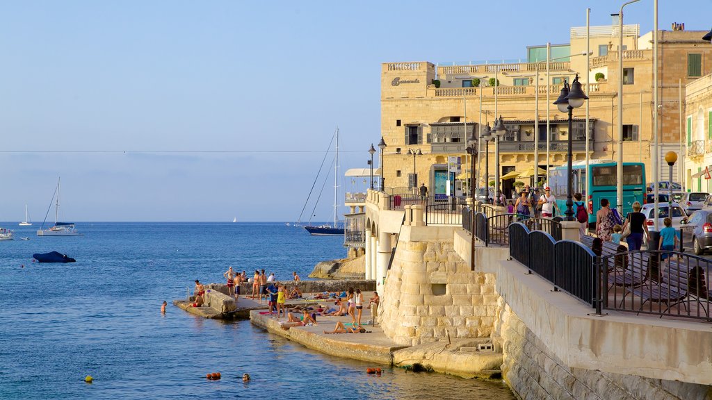 Balluta Bay showing general coastal views, a bay or harbour and heritage architecture