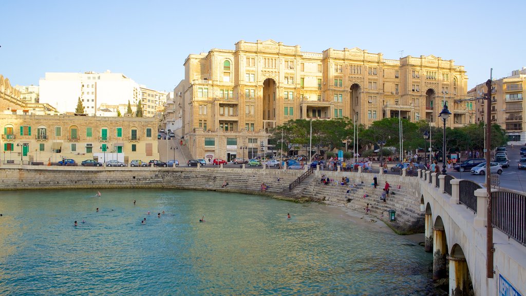 Balluta Bay showing a bay or harbour and heritage architecture