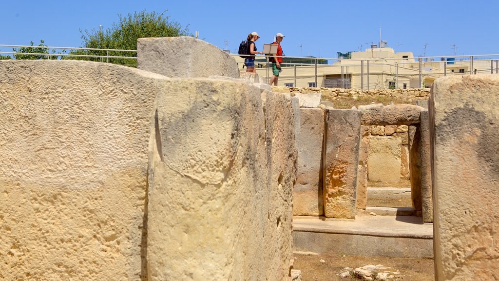 Det Megalitiske Tempel Tarxien som viser historiske bygningsværker