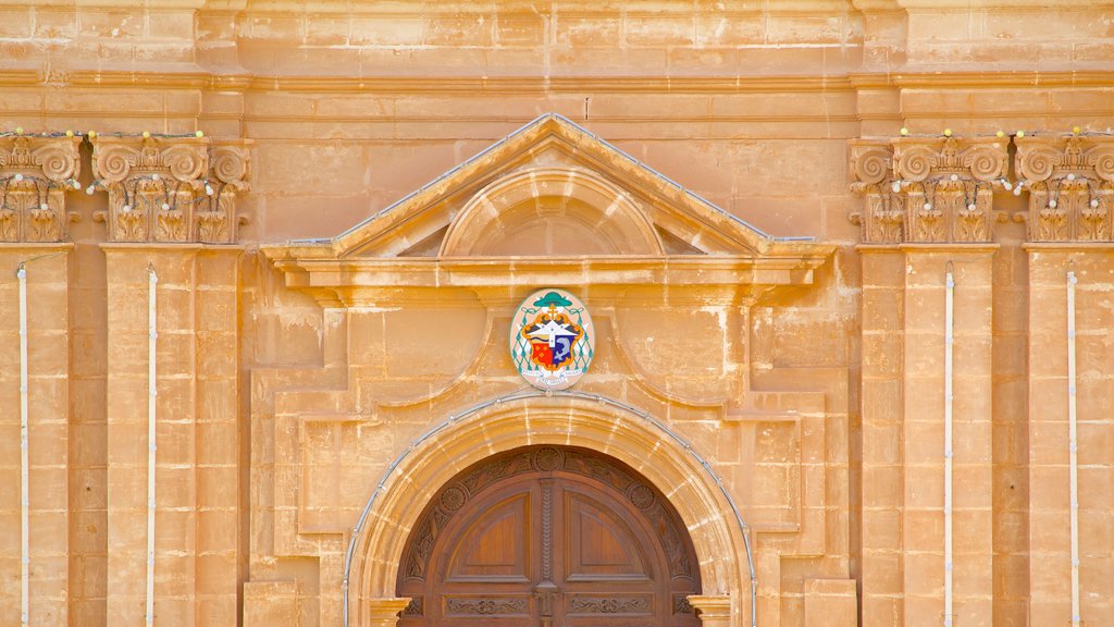 Mellieha Church which includes heritage architecture, a church or cathedral and religious aspects