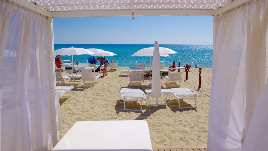 Cala Sinzias which includes a beach