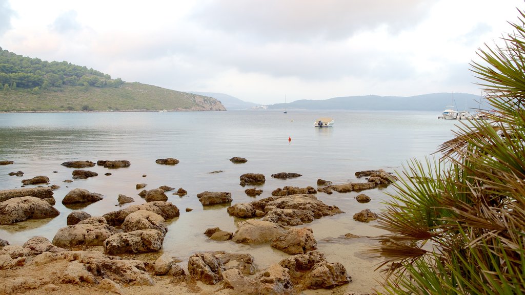 Capo Caccia which includes rocky coastline