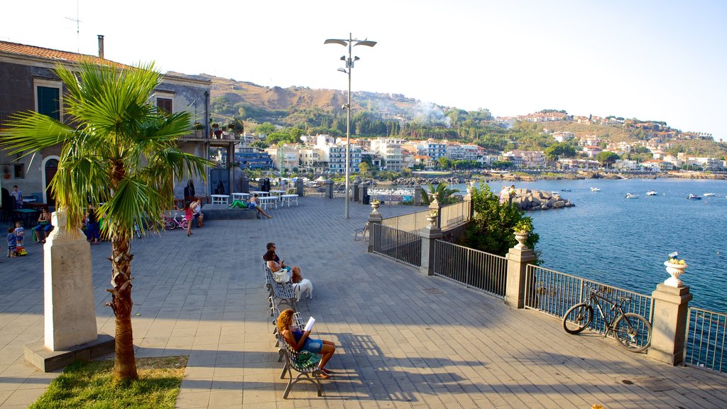 Aci Castello which includes general coastal views