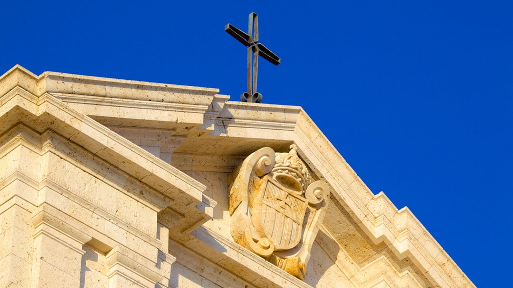 Sanctuary of Our Lady of Bonaria which includes heritage architecture, religious elements and a church or cathedral