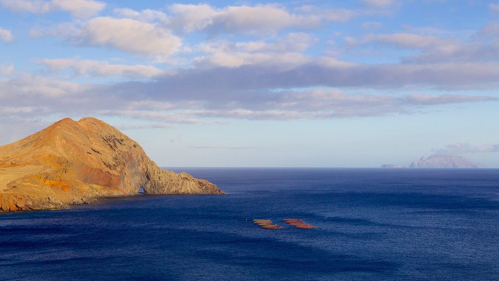 Sao Lourenco Point featuring mountains and rocky coastline