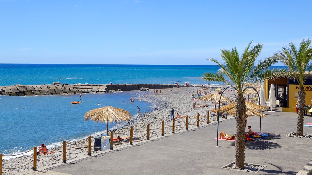 Ponta Do Sol Beach featuring a pebble beach