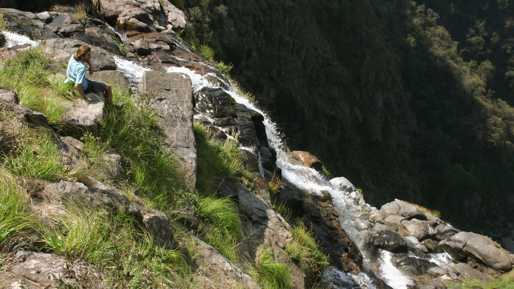 Tucuman featuring a waterfall as well as an individual male