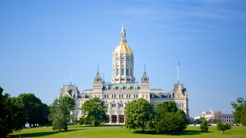 Bushnell Park showing heritage architecture, chateau or palace and a garden