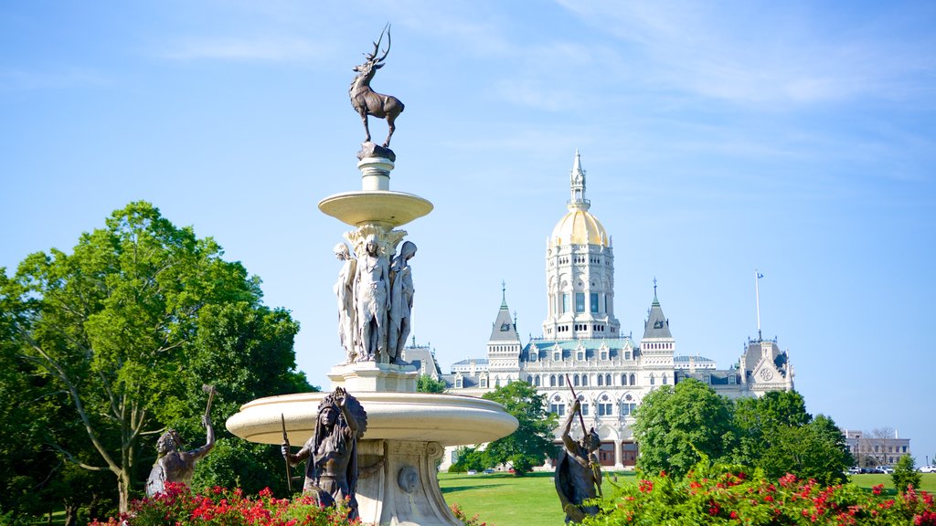 Bushnell Park ofreciendo una estatua o escultura y un jardín